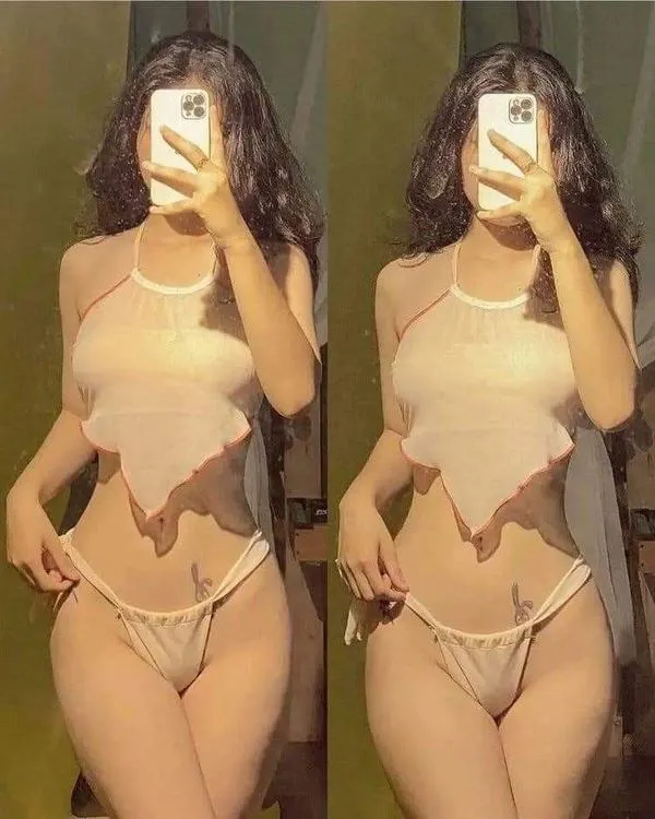 Nàng mặc đồ mỏng, đường cong mềm, tóc dài che nửa mặt, thần thái lạ, nhìn phát là dính