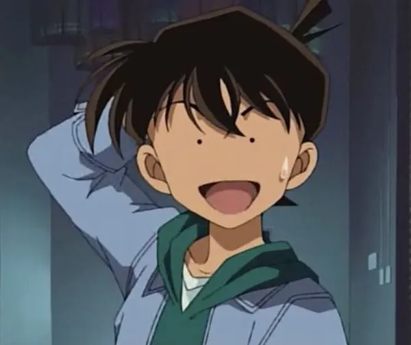 Bộ ảnh Kudo Shinichi đỏ mặt đáng yêu, tông ấm nhẹ, biểu cảm lúng túng nhìn là mềm tim